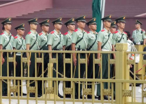 Armed Police Force officers patrol near Tiananmen in Beijing, China on July 15, 2024. The third plenum kicks off on the same day.