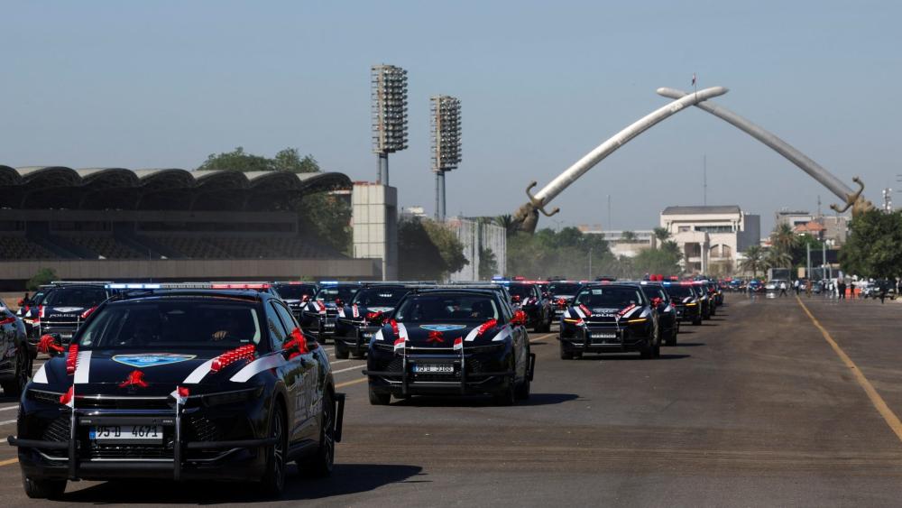 Vehicles of the Iraqi security forces parade under the Victory Arch during Independence Day celebrations at the Grand Festivities Square in Baghdad's Green Zone, Iraq October 3, 2025.