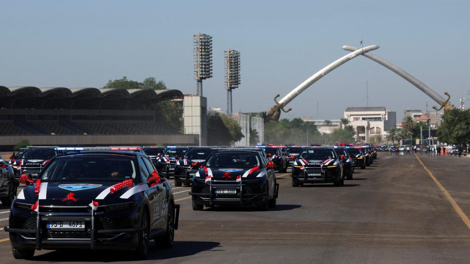 Vehicles of the Iraqi security forces parade under the Victory Arch during Independence Day celebrations at the Grand Festivities Square in Baghdad's Green Zone, Iraq October 3, 2025.