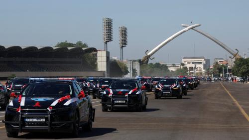 Vehicles of the Iraqi security forces parade under the Victory Arch during Independence Day celebrations at the Grand Festivities Square in Baghdad's Green Zone, Iraq October 3, 2025.