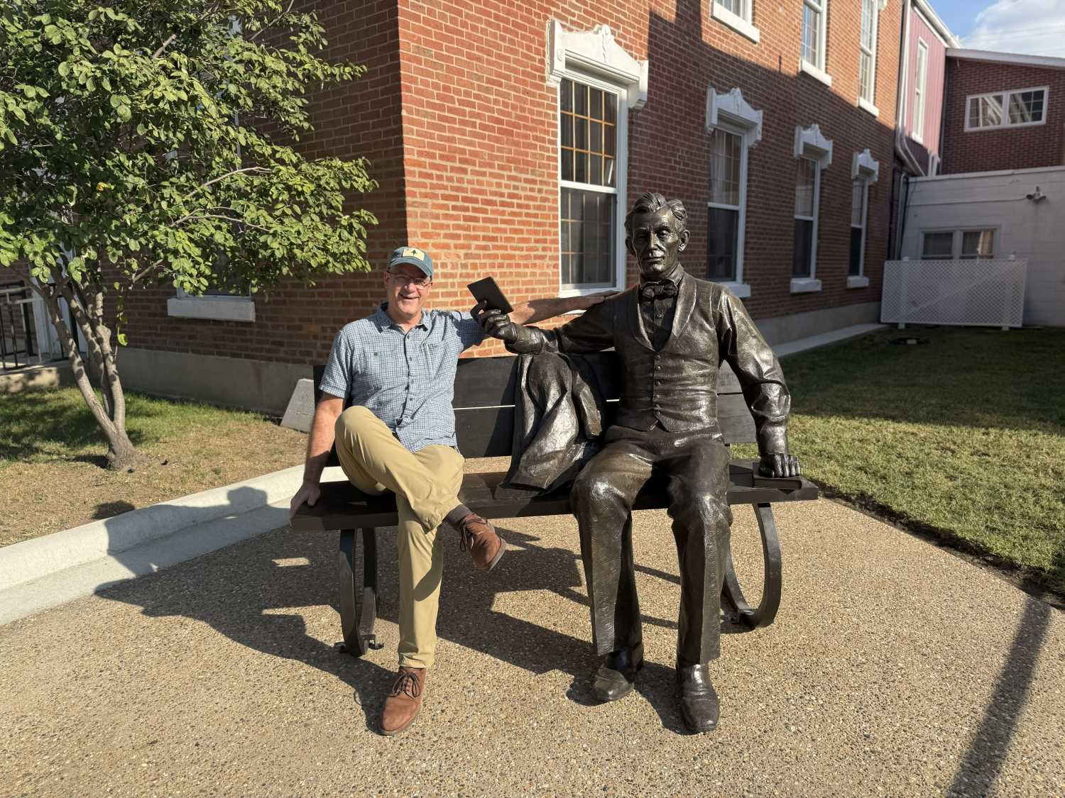 Show host Tony Pipa takes a seat with Springfield attorney Abraham Lincoln, Beardstown, Illinois