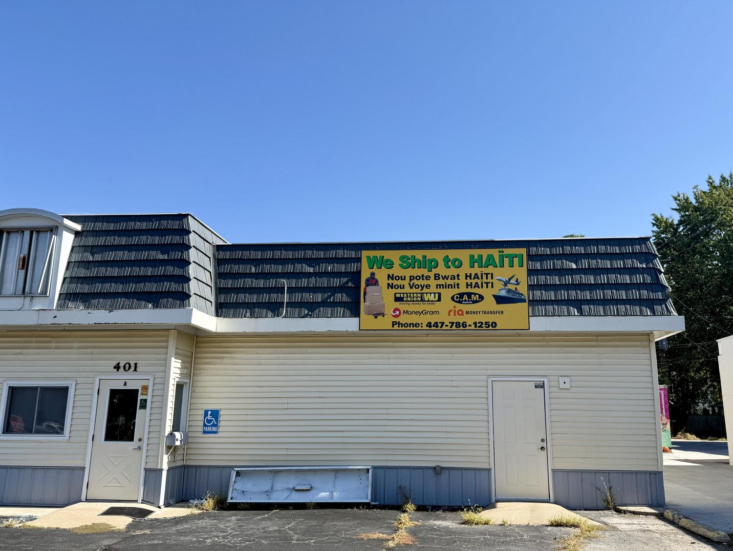 "We Ship To Haiti sign" seen in Beardstown, Illinois.