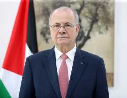 headshot of PM of Palestine Mohammad Mustafa