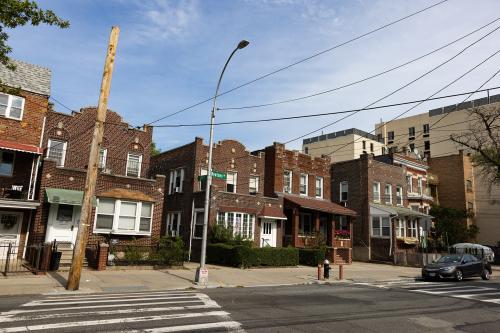 Queens, New York USA - September 17 2023: Row of Old Brick Homes along the Street in Astoria Queens of New York City
