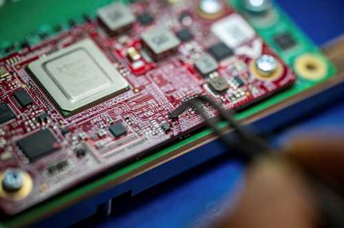 Recently launched Amazon artificial intelligence processors that aim to tackle Nvidia and the chips made by the other hyperscalers such as Microsoft and Google are shown at an Amazon lab in Austin, Texas.