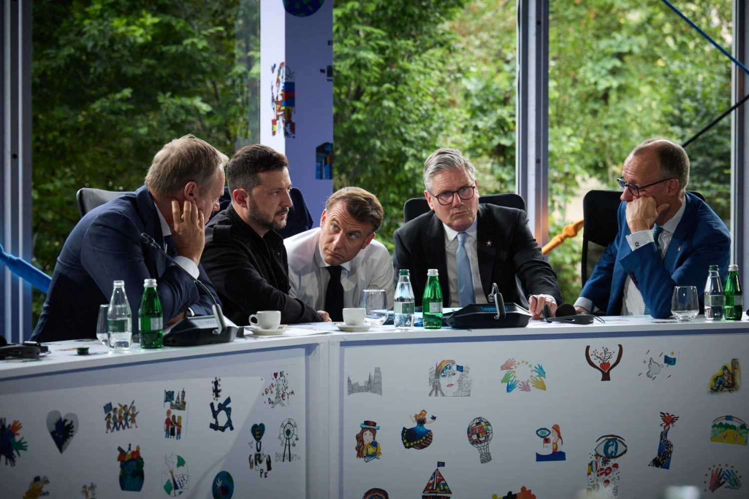 Ukraine's President Volodymyr Zelenskiy, Britain's Prime Minister Keir Starmer, France's President Emmanuel Macron, German Chancellor Friedrich Merz and Polish Prime Minister Donald Tusk speak with U.S. President Donald Trump via phone during the European Political Community Summit in Tirana, Albania May 16, 2025.