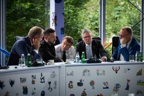 Ukraine's President Volodymyr Zelenskiy, Britain's Prime Minister Keir Starmer, France's President Emmanuel Macron, German Chancellor Friedrich Merz and Polish Prime Minister Donald Tusk speak with U.S. President Donald Trump via phone during the European Political Community Summit in Tirana, Albania May 16, 2025.
