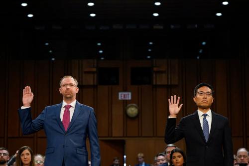 Joshua Dunlap, U.S. President Donald Trump's nominee to be United States Circuit judge for the First Circuit, and Eric Tung, Trump's nominee to be a United States Circuit judge for the Ninth Circuit, are sworn in during a Senate Judiciary Committee confirmation hearing on Capitol Hill in Washington, D.C., U.S., on July 30, 2025.
