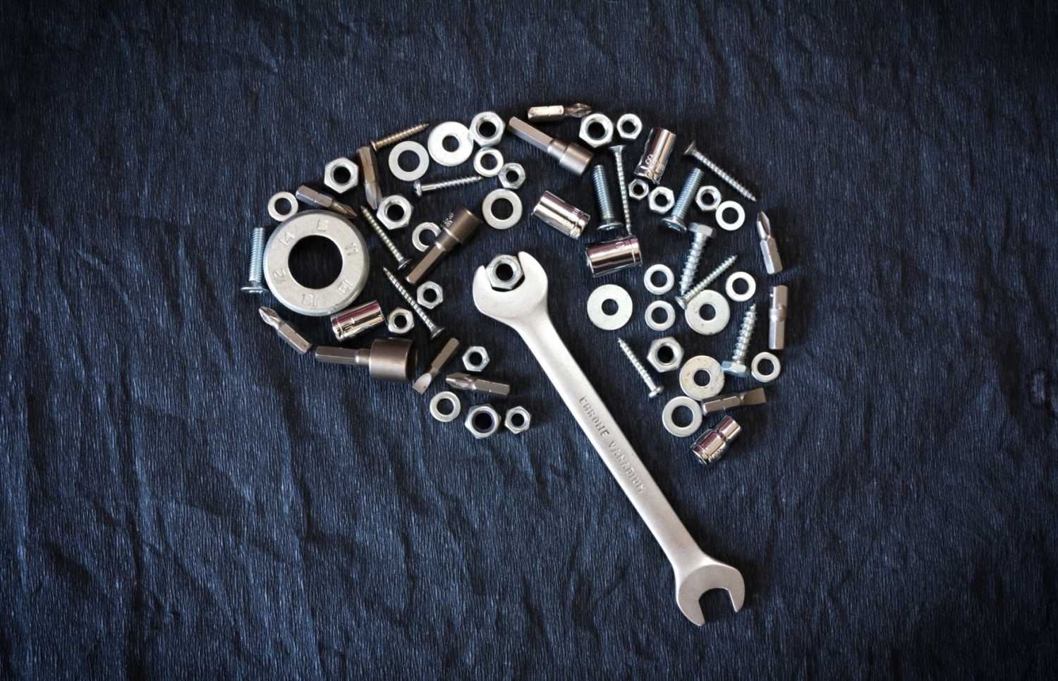 Brain made of nuts, bolts, and a wrench