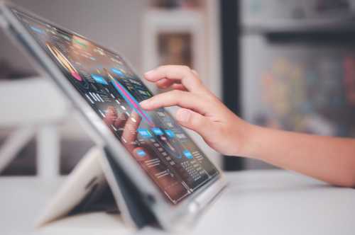 A child uses a digital tablet