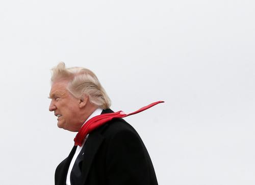 U.S. President-elect Donald Trump and Vice-President elect Mike Pence walk off Trump's plane upon their arrival in Indianapolis, Indiana, U.S., December 1, 2016.