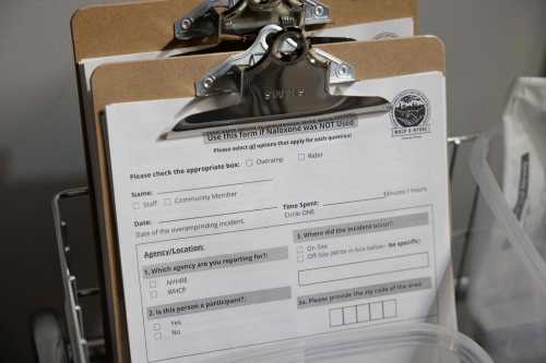 In this November 30, 2021 photo, information forms are shown during the media tour of the supervised drug injection site OnPoint, in New York.