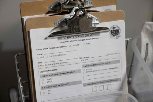 In this November 30, 2021 photo, information forms are shown during the media tour of the supervised drug injection site OnPoint, in New York.