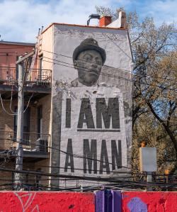 Mural I am a Man by artists Darius Dennis, Robin Alcantara, Jared Diaz, and Ephraim Gebre in the Wicker Park neighborhood of Chicago.