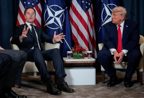 U.S. President Donald Trump (R) listens as NATO Secretary General Mark Rutte speaks during a bilateral meeting on the sidelines of the World Economic Forum (WEF) Annual Meeting on January 21, 2026 in Davos, Switzerland.