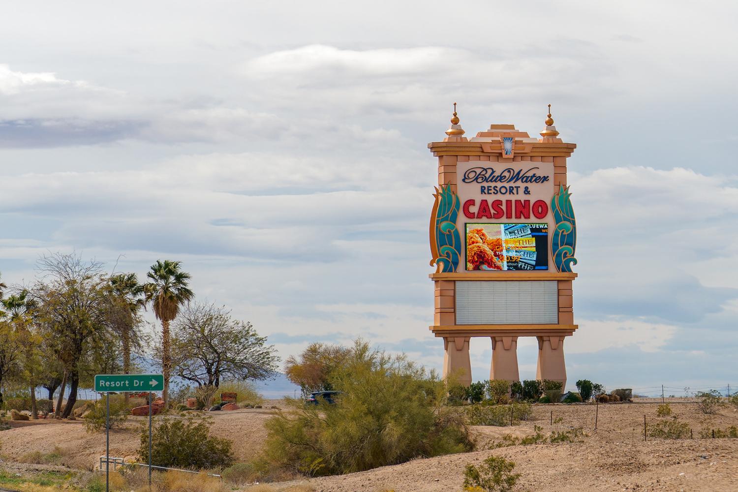 Parker, AZ - March 10, 2023: Sign for the BlueWater Casino and Resort Hotel, is owned by the Colorado River Indian Tribes of AZ and CA.