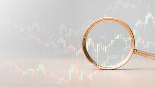 An illustration of a magnifying glass in front of a chart.