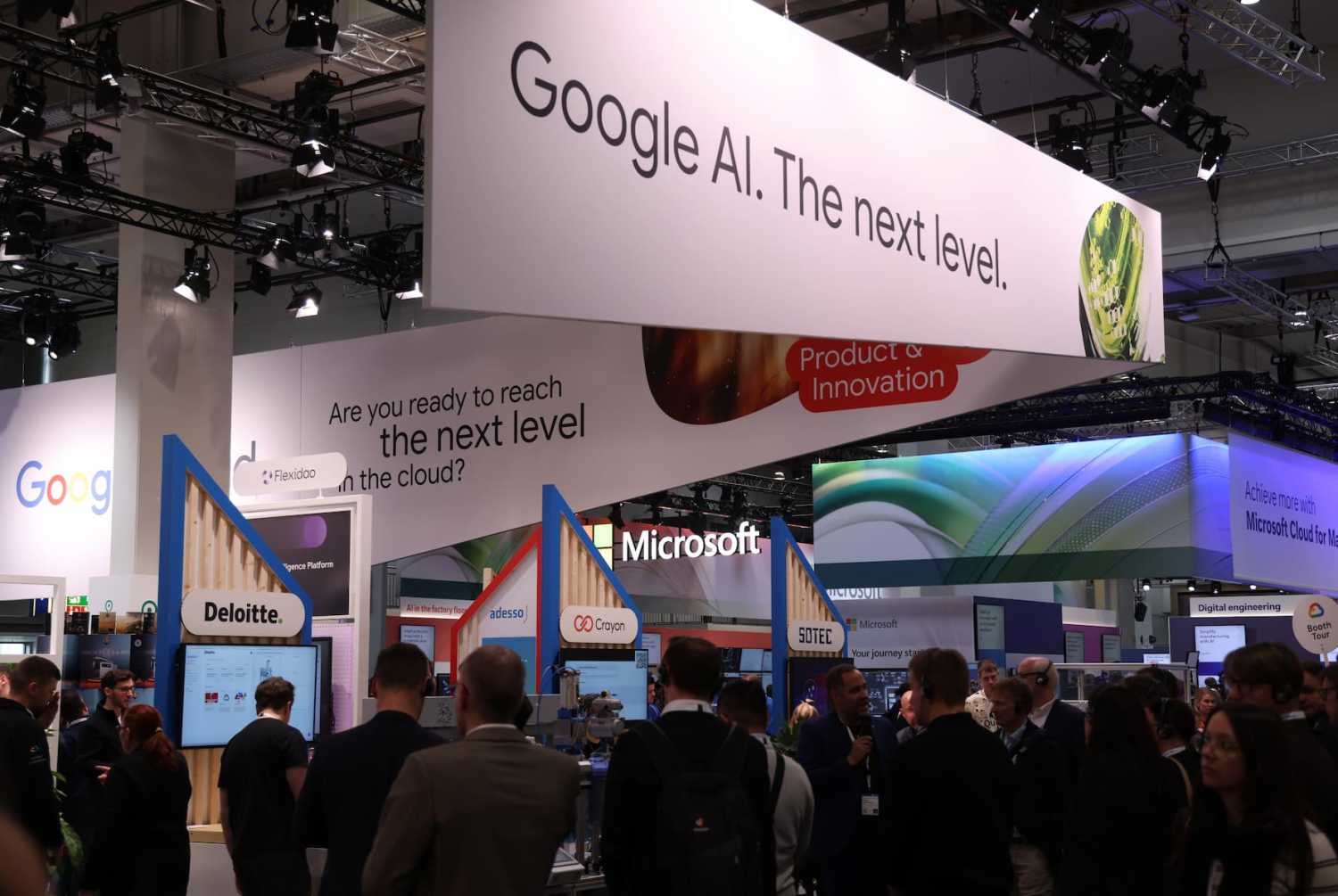 HANOVER, GERMANY - MARCH 31: The Google Cloud and Microsoft pavilions stand next to each other at the 2025 Hannover Messe industrial trade fair on March 31, 2025 in Hanover, Germany. The fair, which showcases German and international industrial production, is taking place as trade relations between the European Union and the United States are becoming fractured by the threat of tariffs by the administration of U.S. President Donald Trump.