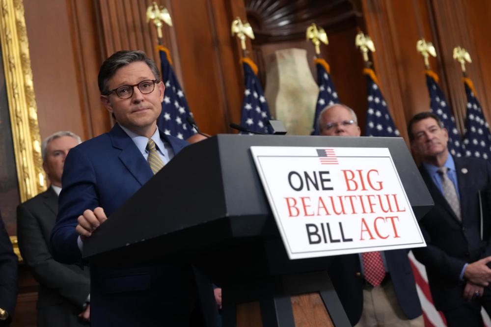 U.S. Speaker of the House Mike Johnson (R-La.) speaks to the media after the House narrowly passed a bill forwarding President Donald Trump's agenda at the U.S. Capitol on May 22, 2025 in Washington, DC. The tax and spending legislation, in what has been called the "Big Beautiful Bill," redirects money to the military and border security and includes cuts to Medicaid, education, and other domestic programs. Johnson was flanked by House Committee Chairmen who helped craft the legislation.