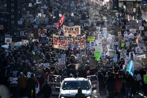 Protesters against Immigration and Customs Enforcement (ICE) march through the streets of downtown Minneapolis, Minnesota, on January 25, 2026. On January 24, federal agents shot dead U.S. citizen Alex Pretti, a 37-year-old ICU nurse, while scuffling with him on an icy roadway, less than three weeks after an immigration officer shot and killed Renee Good, also 37, in her car. His killing sparked new protests and impassioned demands by local leaders for the Trump administration to end its operation in the city.