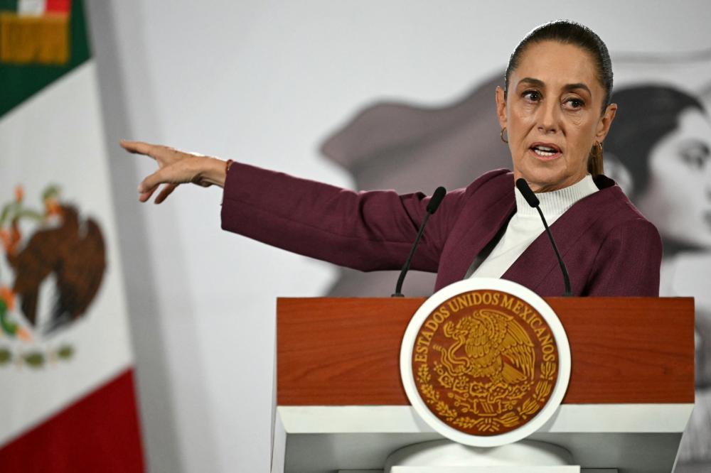Mexico's President Claudia Sheinbaum speaks during her daily press conference at Palacio Nacional in Mexico City on February 12, 2026.