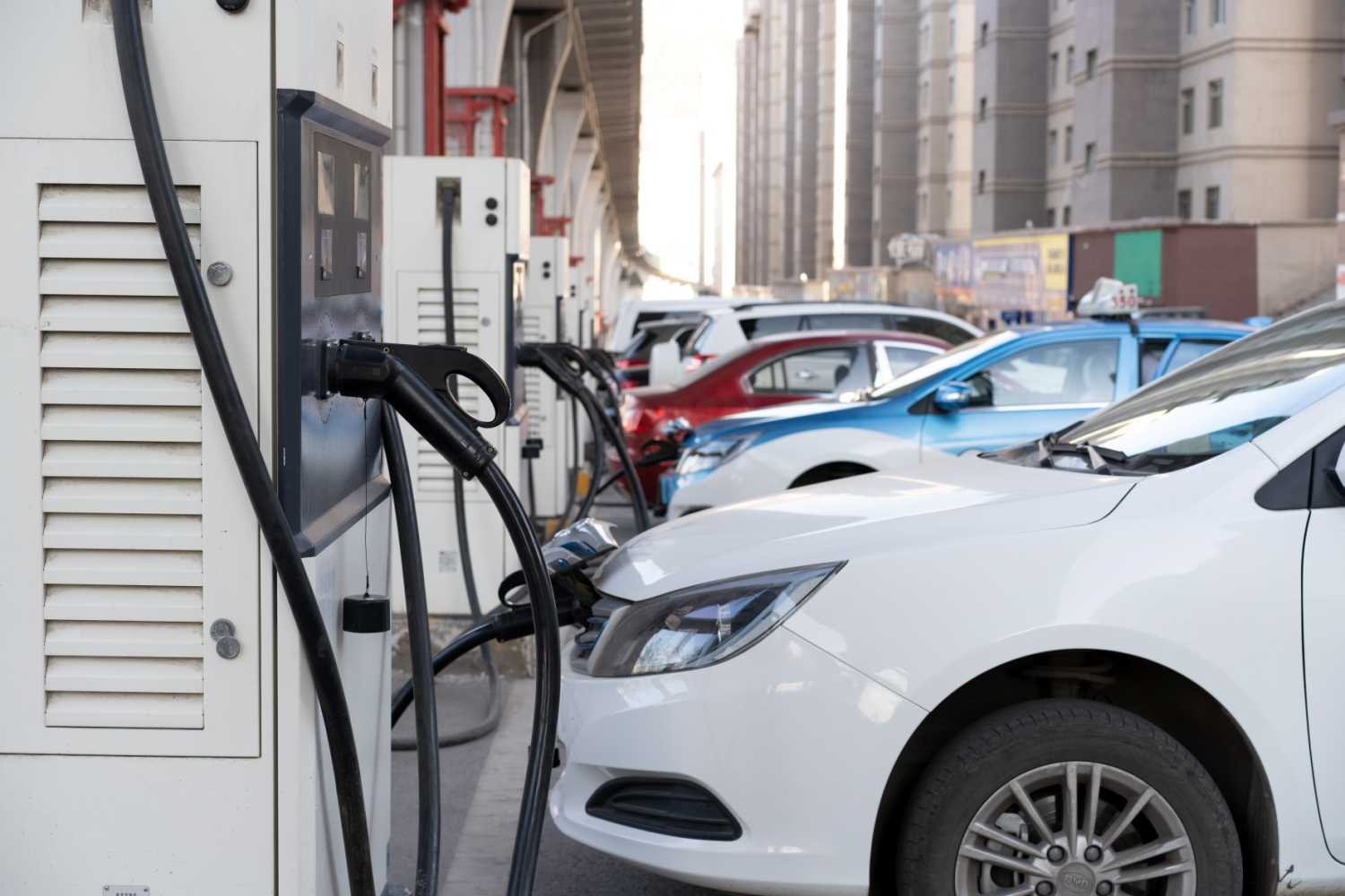 Some electric vehicles are charging at the urban public charging station in Xining City.
