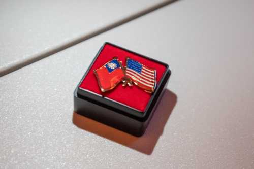 A photo illustration shows a pin depicting the Taiwan and U.S. flags, during Taiwan President Lai Ching-te's visit in Honolulu, Hawaii, on November 30, 2024.