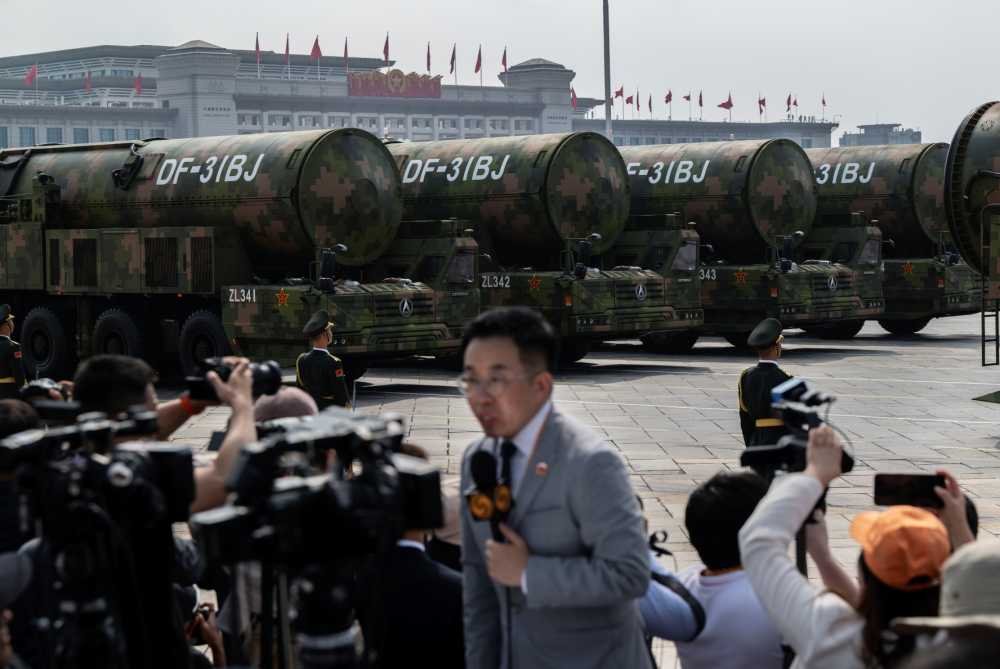 Nuclear capable DF-31BJ ballistic missiles are seen as they are unveiled on transporters during a military parade marking the 80th anniversary of victory over Japan and the end of World War II, in Tiananmen Square on September 3, 2025, in Beijing, China.