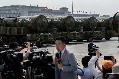 Nuclear capable DF-31BJ ballistic missiles are seen as they are unveiled on transporters during a military parade marking the 80th anniversary of victory over Japan and the end of World War II, in Tiananmen Square on September 3, 2025, in Beijing, China.