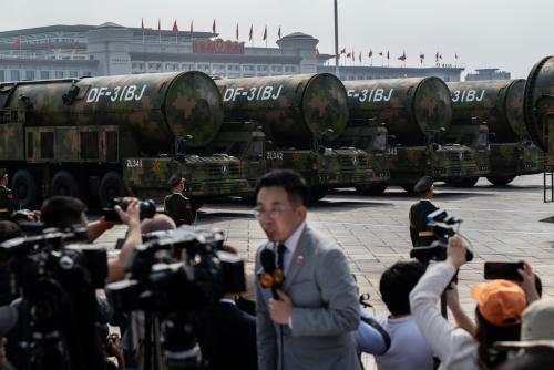 Nuclear capable DF-31BJ ballistic missiles are seen as they are unveiled on transporters during a military parade marking the 80th anniversary of victory over Japan and the end of World War II, in Tiananmen Square on September 3, 2025, in Beijing, China.