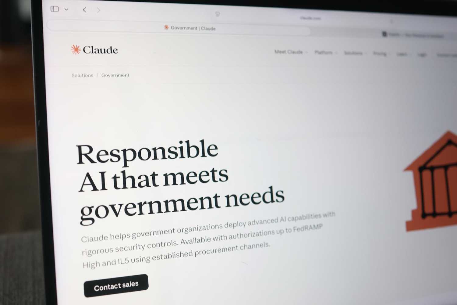 the Claude AI website is seen on a laptop