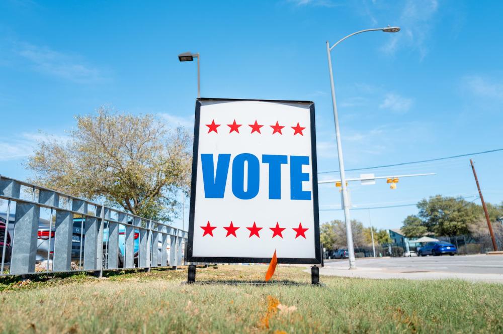 AUSTIN, TEXAS - MARCH 03: A "VOTE" sign is posted near a polling center on March 03, 2026 in Austin, Texas. Texas holds their primary elections including two hotly contested races for Democratic and Republican Senate nominations. (Photo by Brandon Bell/Getty Images)