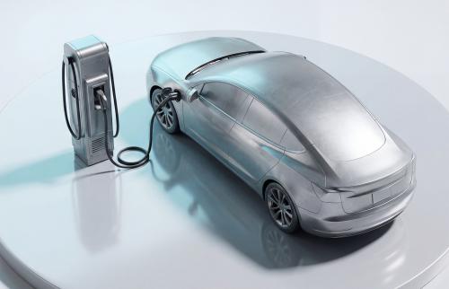 An electric vehicle recharges