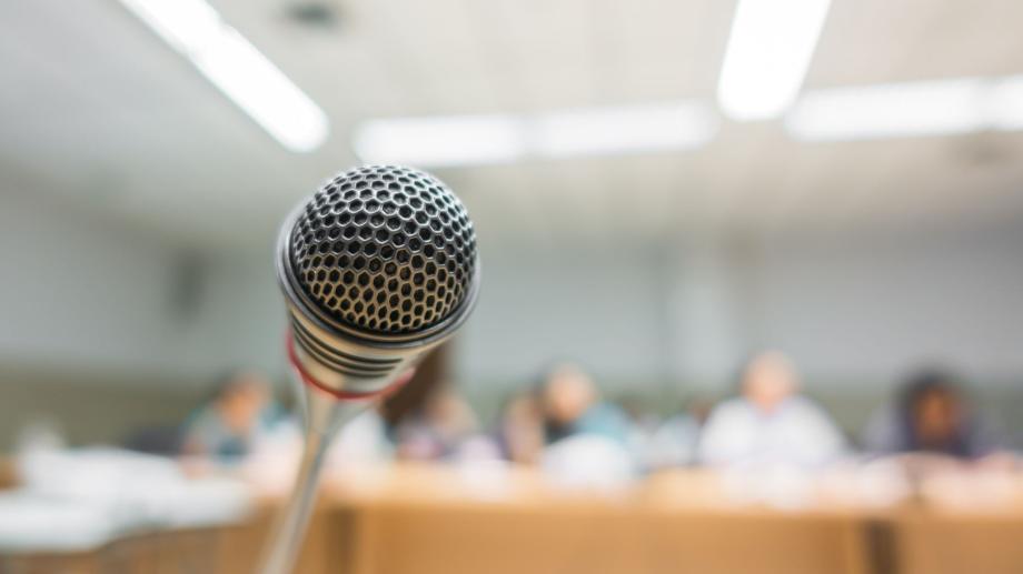 Illustration of a person giving a presentation