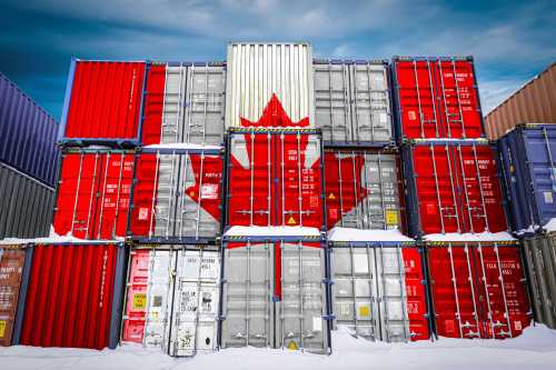 Shipping containers stacked three high with the Canadian flag superimposed