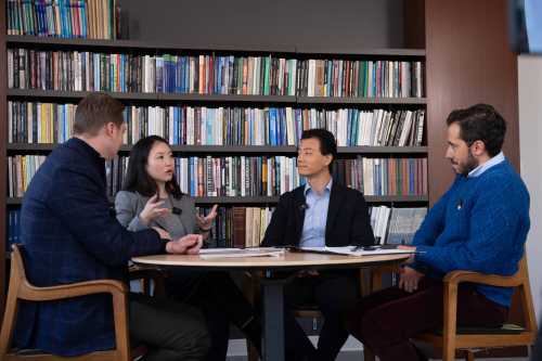 Scholars at a round table discussing US-China policy
