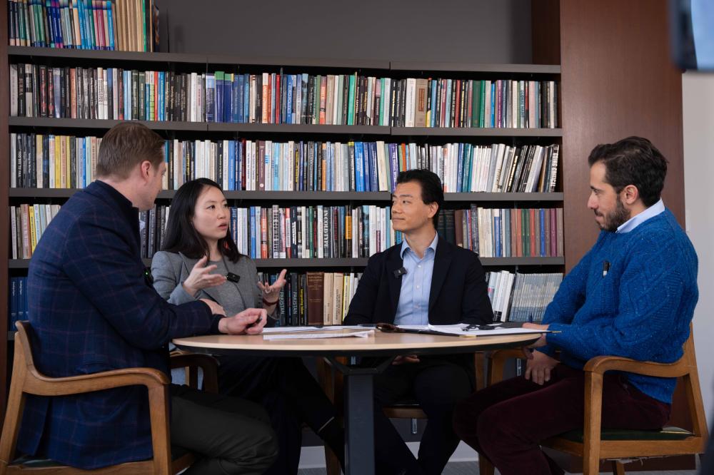 Scholars at a round table discussing US-China policy