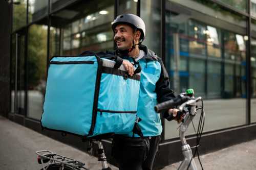 Delivery worker on bike