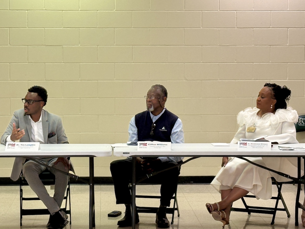 Tim Lampkin of Higher Purpose Hub, Clifton Williams of Guaranty Bank, and Dr. Glendscene Williams of Delta State University discussing entrepreneurship and economic development in the Mississippi Delta.