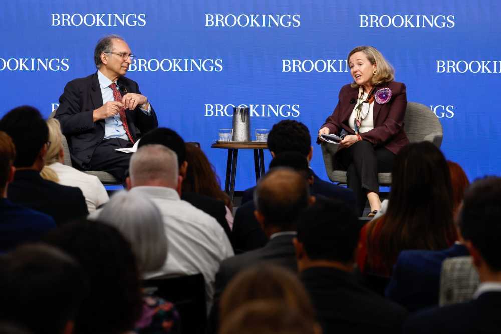 Brookings Senior Fellow Homi Kharas and European Investment Bank President Nadia Calviño engage in conversation during a discussion on strengthening multilateral development finance cooperation.
