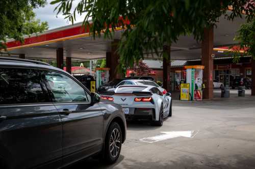 Cars line up to fill their gas tanks at a Circle K near uptown Charlotte, North Carolina on May 11, 2021 following a ransomware attack that shut down the Colonial Pipeline.