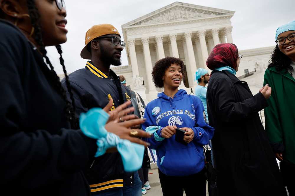WASHINGTON, DC - OCTOBER 31: Students from Harvard College, North Carolina Agricultural and Technical State University, and other HBCUs join fellow proponents of affirmative action in higher education to rally in front of the U.S. Supreme Court on October 31, 2022 in Washington, D.C.