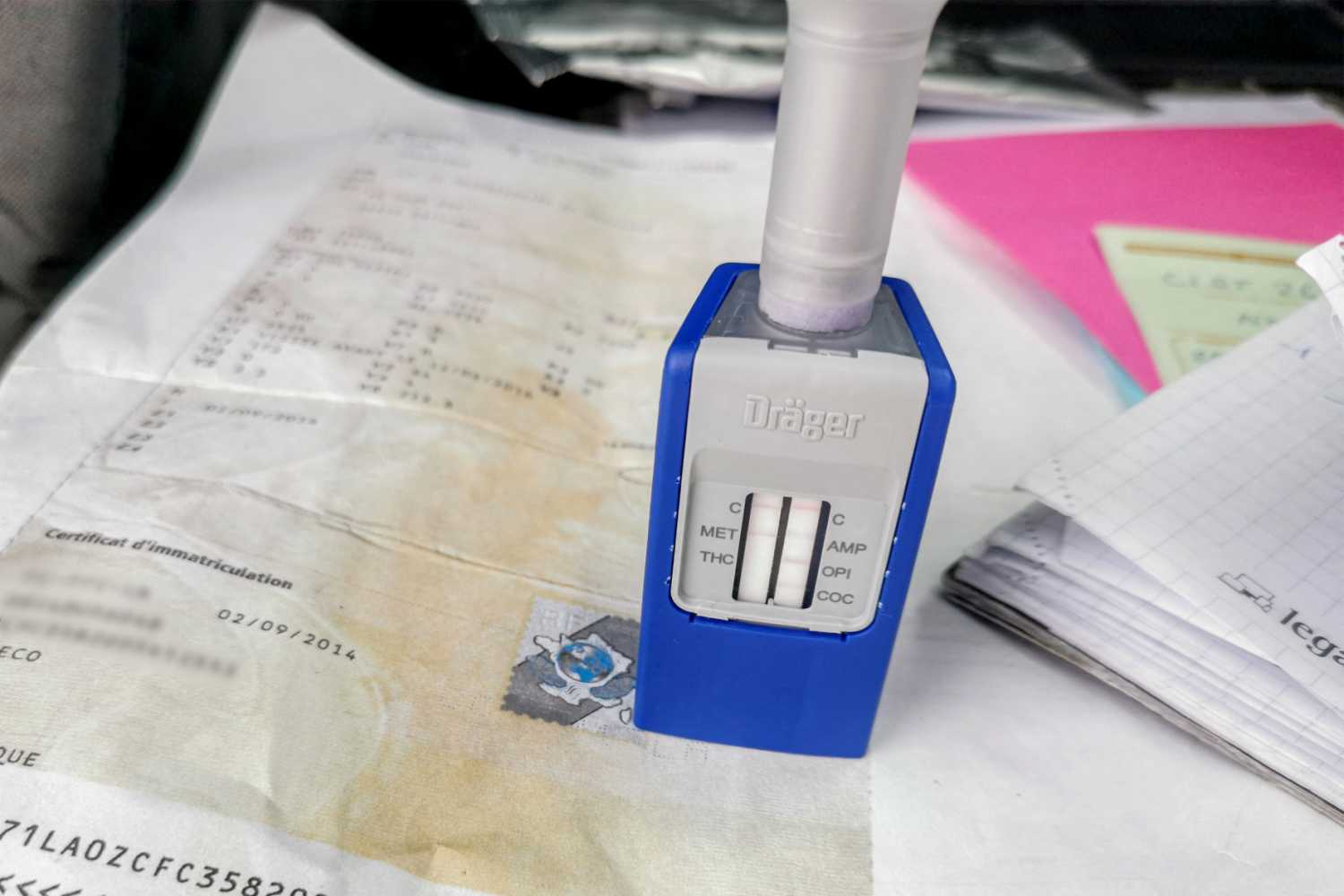 A Drager saliva drug test that simultaneously detects 5 drugs (cocaine, opiates, amphetamines, synthetic drugs, and cannabis) is placed on a motorist registration card during a police roadside check in Montpellier, France, October 23, 2024.