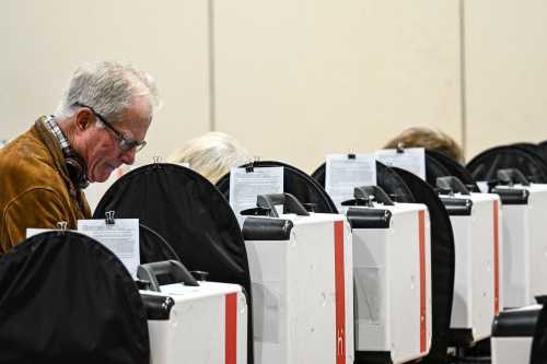 People vote on Election Day at a polling location at West Gray Metropolitan Multi-Service Center in Houston, on March 3, 2026. Americans cast the first ballots of the primary season on Tuesday, kicking off a midterm cycle that could redraw the political map in Washington—and shape how Donald Trump spends the remainder of his presidency. Texas anchors the opening slate, with voters in the second-largest state selecting their candidates in high-profile Senate primaries, offering an early test of how both parties position themselves for Trump's final two years.
