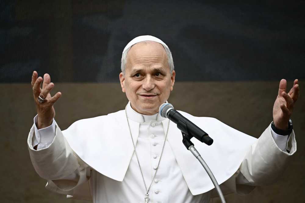 Pope Leo XIV gestures as he speaks during a pastoral visit to the "Sacred Heart of Jesus" Parish in Ponte Mammolo on the Fourth Sunday of Lent, in Rome on March 15, 2026.