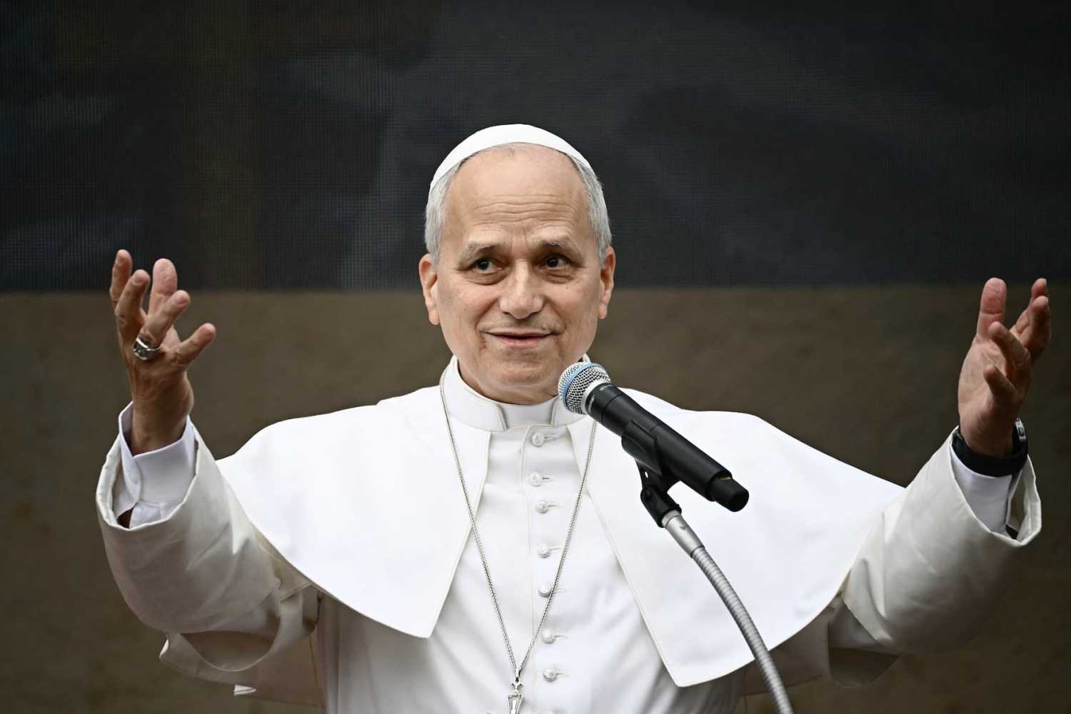 Pope Leo XIV gestures as he speaks during a pastoral visit to the "Sacred Heart of Jesus" Parish in Ponte Mammolo on the Fourth Sunday of Lent, in Rome on March 15, 2026.