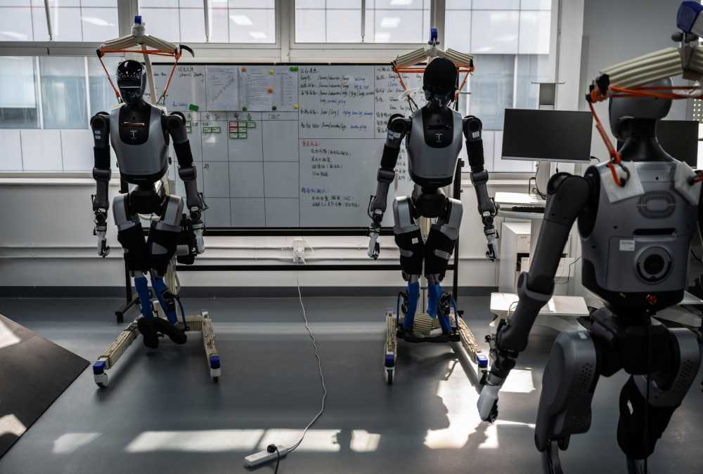 Humanoid robots are seen in the production facility of X-Humanoid at the Beijing Innovation Center of Humanoid Robotics on March 20, 2026 in Beijing, China.