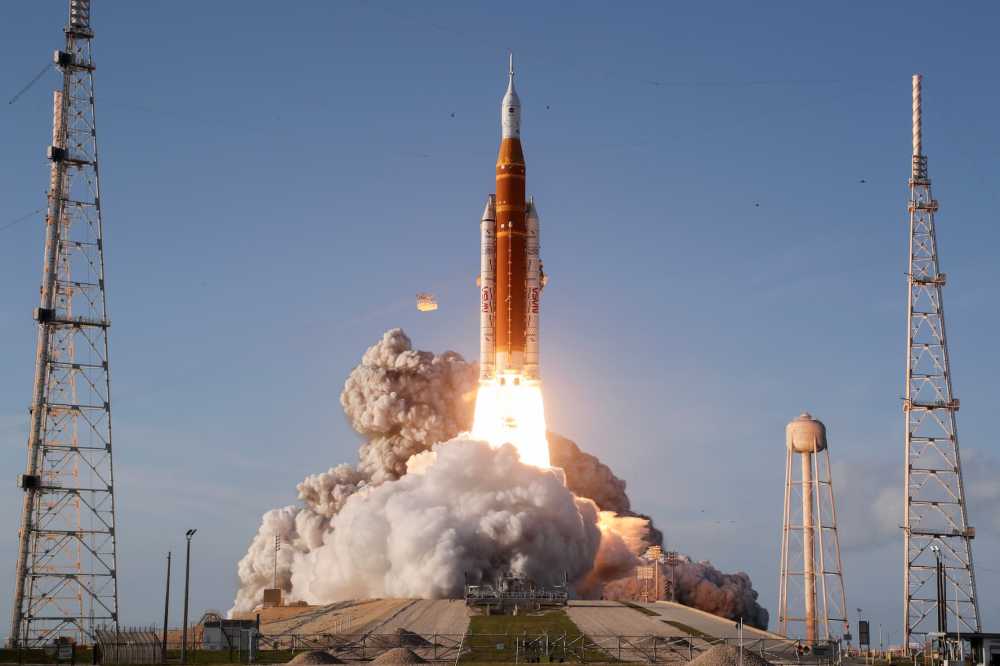 CAPE CANAVERAL, FLORIDA - APRIL 01: NASA's Artemis II Space Launch System rocket carrying the Orion spacecraft lifts off from Launch Complex 39B at Kennedy Space Center on April 1, 2026 in Cape Canaveral, Florida. The 10-day mission will take NASA astronauts Commander Reid Wiseman, Pilot Victor Glover and Mission Specialist Christina Koch and CSA (Canadian Space Agency) Mission Specialist Jeremy Hansen around the moon and back. The astronauts are supposed to fly 230,000 miles out into space, the farthest any human has ever traveled from Earth.