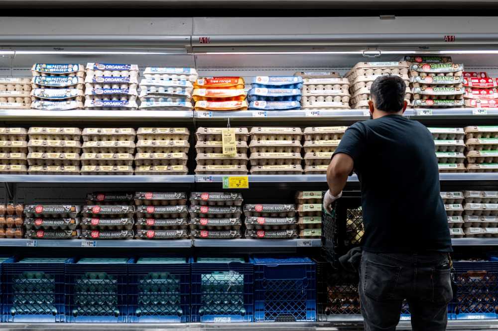 AUSTIN, TEXAS - MAY 11: An employee restocks eggs at an H-E-B grocery store on May 11, 2026 in Austin, Texas. The U.S. Producer Price Index (PPI) suggests that rising fuel prices may be beginning to weigh on wholesale margins, as ongoing tensions in the Strait of Hormuz continue to strain global energy markets.