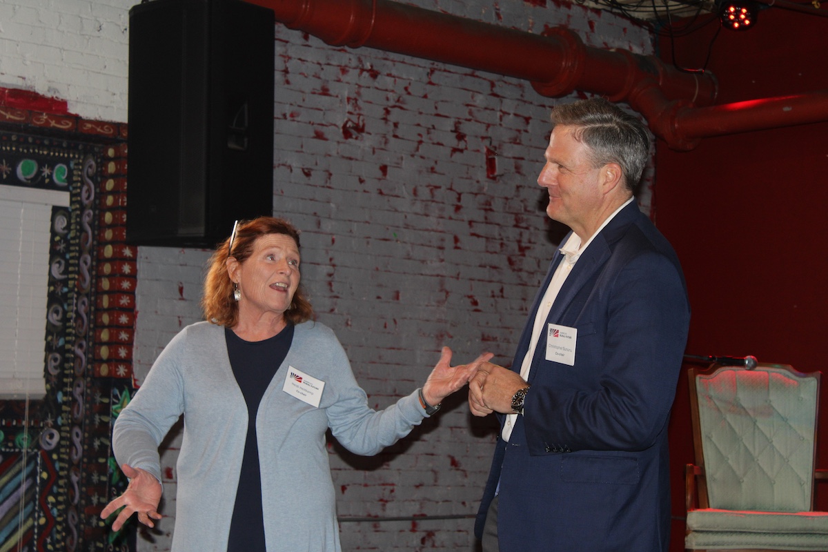 Commission Co-Chairs former Senator Heidi Heitkamp and former Governor Chris Sununu speaking at the evening reception in Jackson, Mississippi.